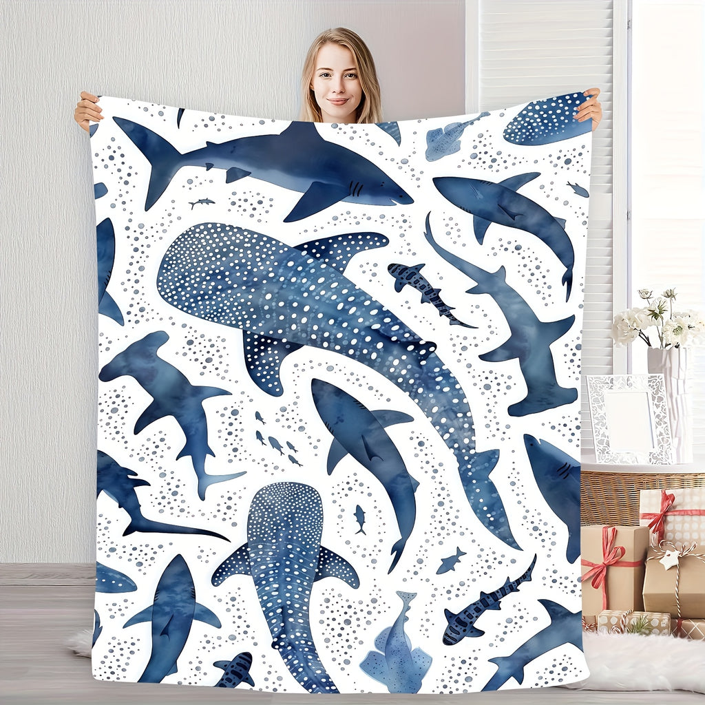 A Soft And Cozy Flannel Blanket Featuring a Marine Blue Whale Shark Theme, Perfect for Home Use.