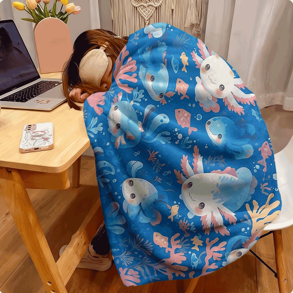 One Cute Axolotl-Themed Flannel Blanket in Blue, Featuring Adorable Axolotls And Coral. This Soft Throw Is Made from Cozy Fabric Suitable for Any Season, Ideal for Animal Enthusiasts