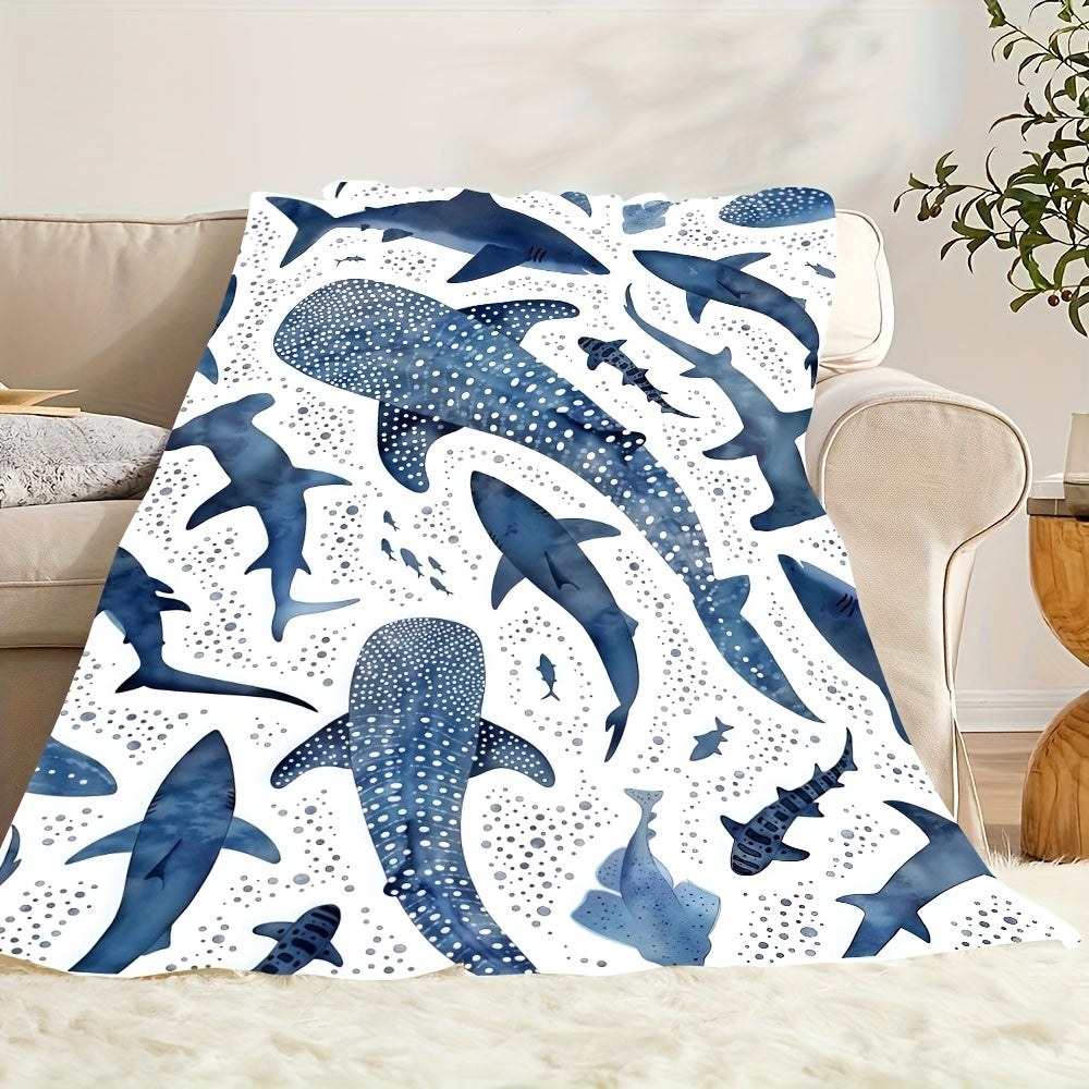 A Soft And Cozy Flannel Blanket Featuring a Marine Blue Whale Shark Theme, Perfect for Home Use.